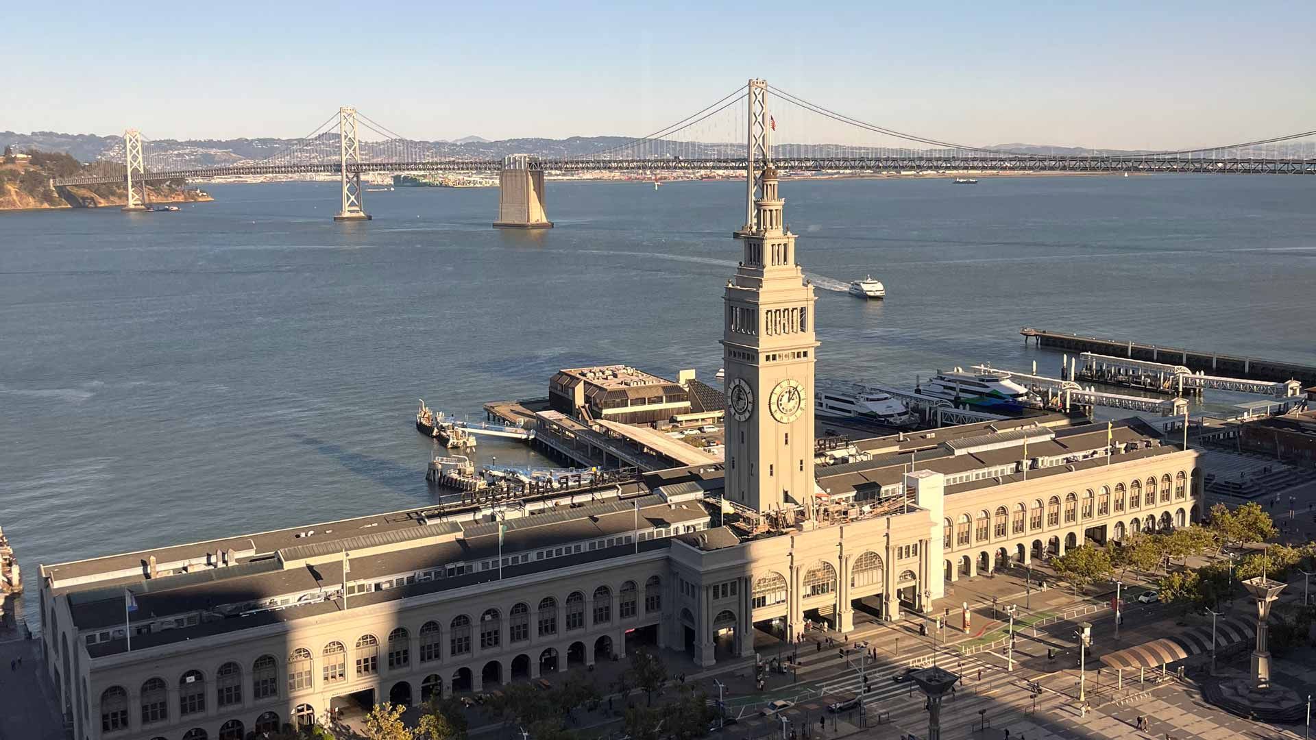 San Francisco ferry building and the Bay Bridge beyond