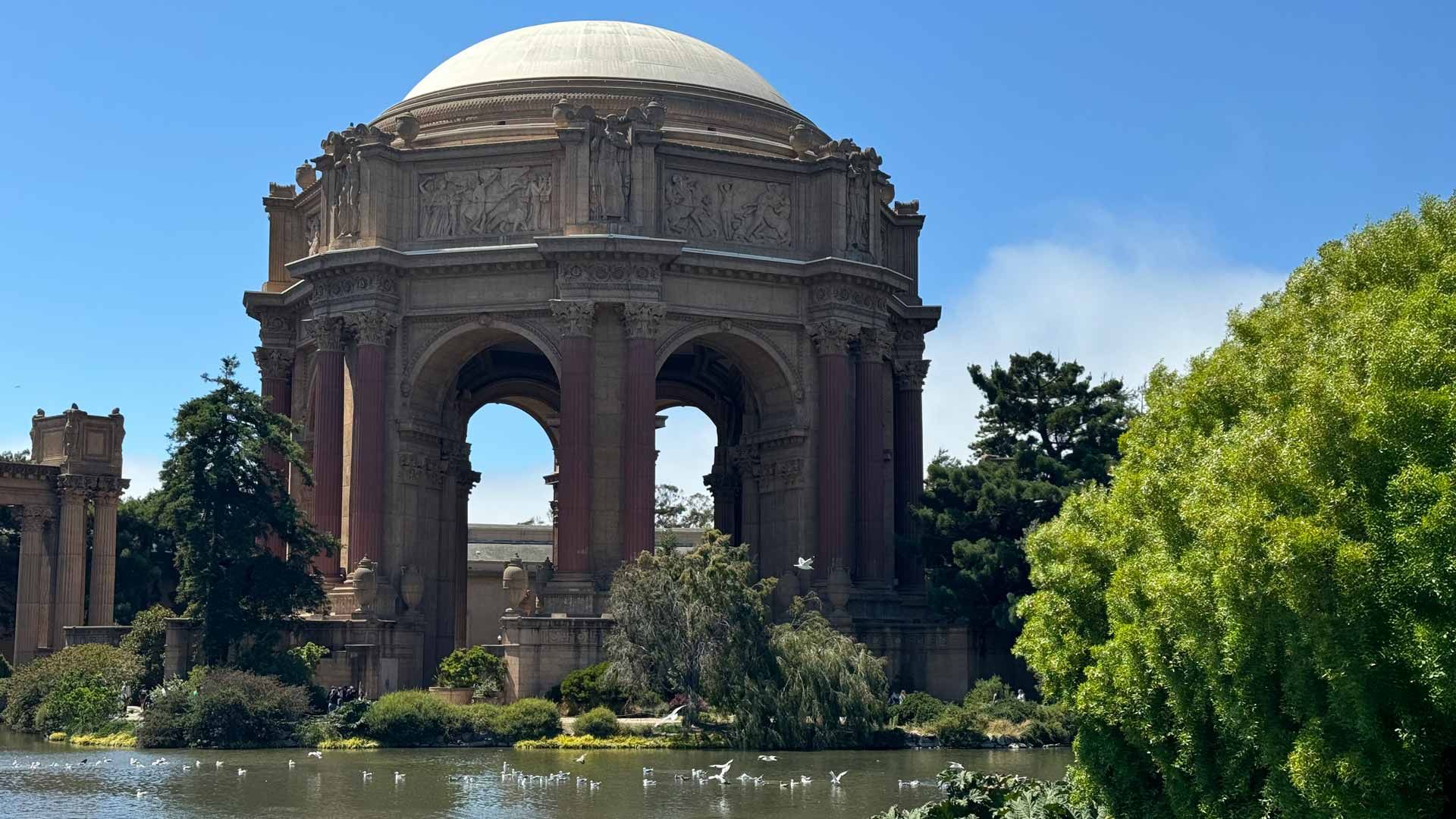 San Francisco Palace of Fine Arts building and pond filled with birds